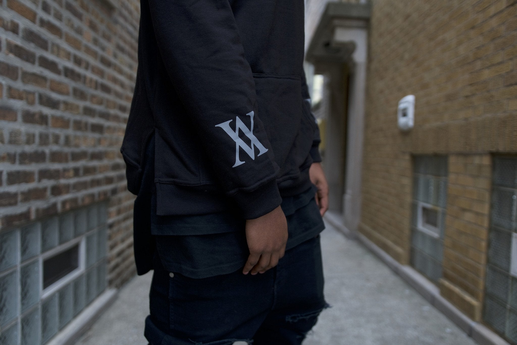 ALMVGHTY 3M Reflective Hoodie - X Logo Close-Up